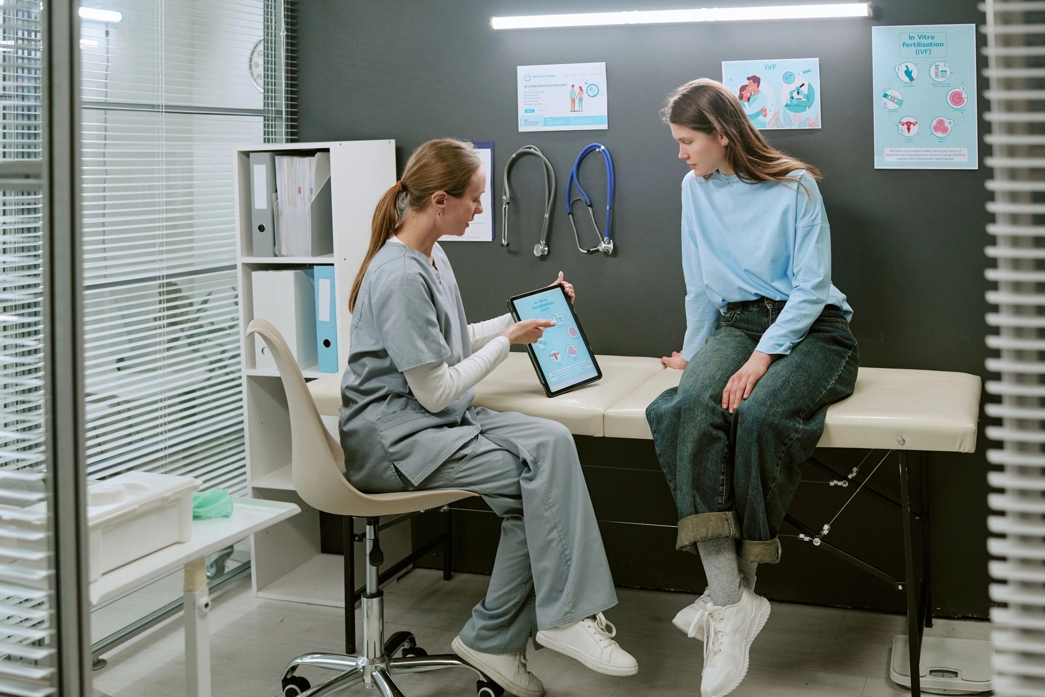 Physician consulting with a patient during an in-office evaluation